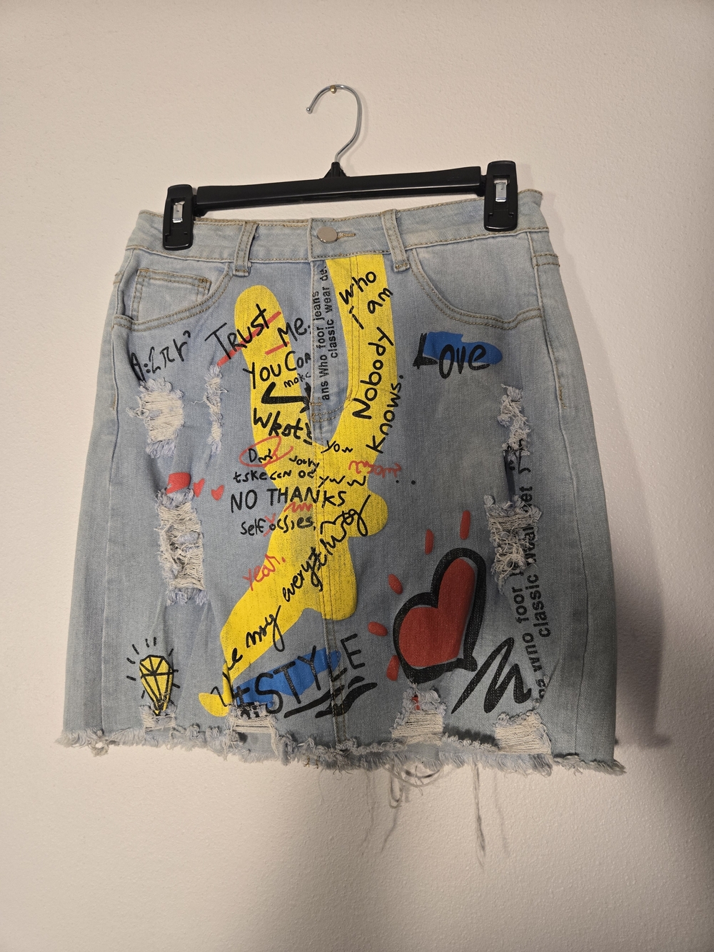 Light Blue Denim Mini Skirt with Hand-Painted Graphic Details